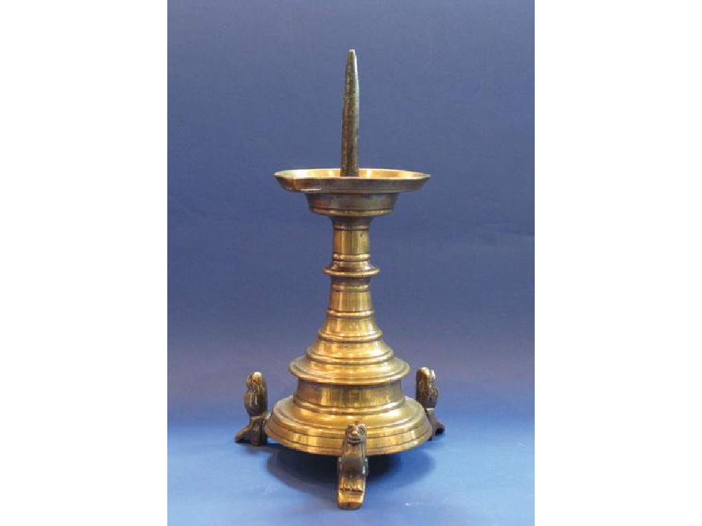 Appraisal: AN ANGLO-FLEMISH BRASS PRICKET CANDLESTICK with a broad drip pan