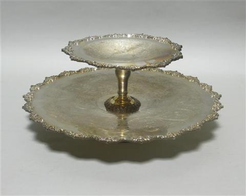 Appraisal: SILVER PLATED REVOLVING DESSERT STAND The elegant server formed as