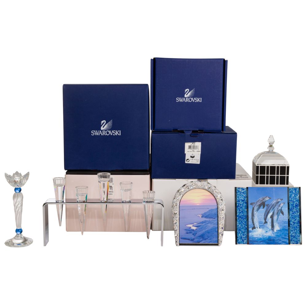 Appraisal: SWAROVSKI CRYSTAL ASSORTMENT items including a Blue Flower candlestick Black