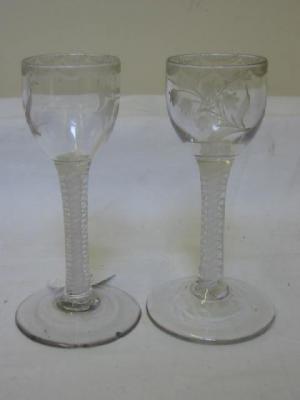 Appraisal: A PAIR OF CORDIAL GLASSES the ovoid bowl wheel cut