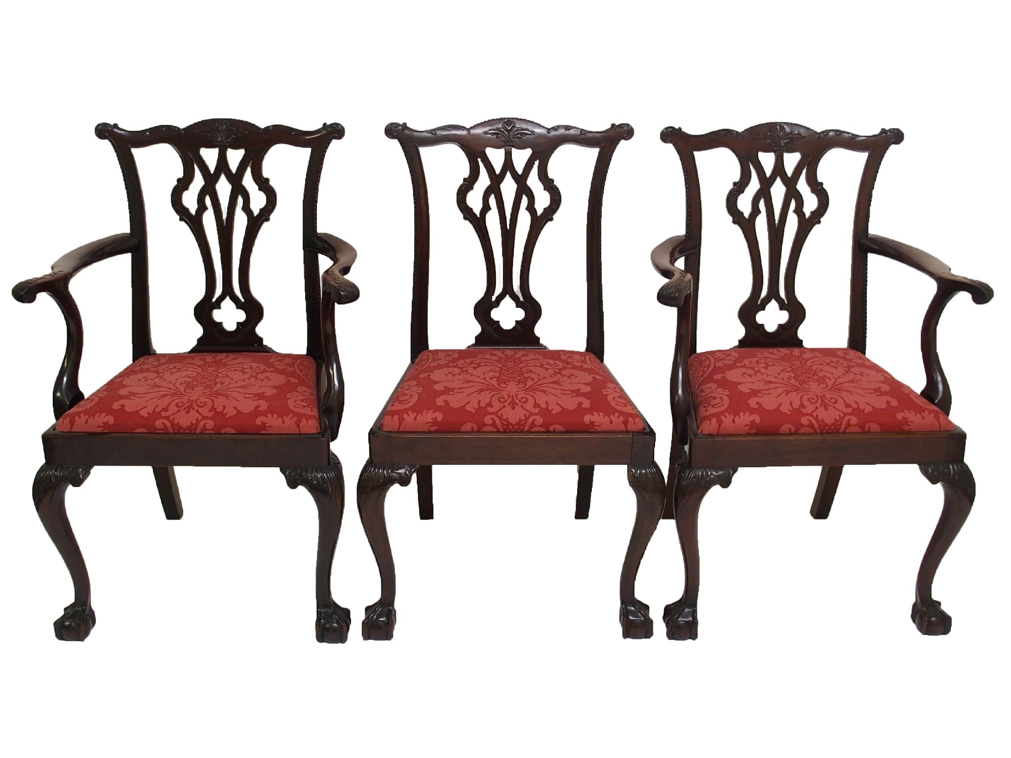 Appraisal: A set of eight Chippendale style mahogany dining chairswith pierced