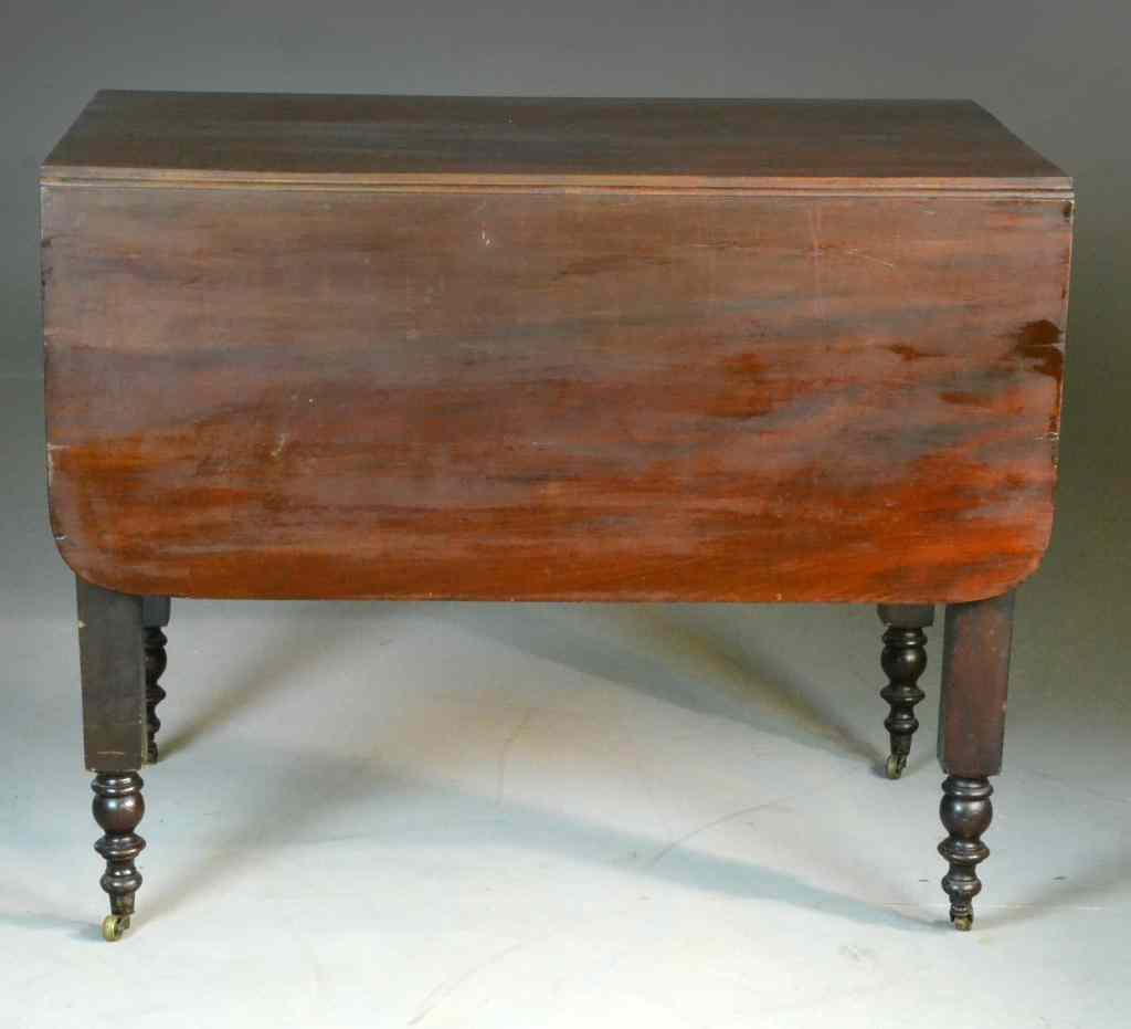 Appraisal: Antique Walnut Drop Leaf TableWalnut table raised on turned square