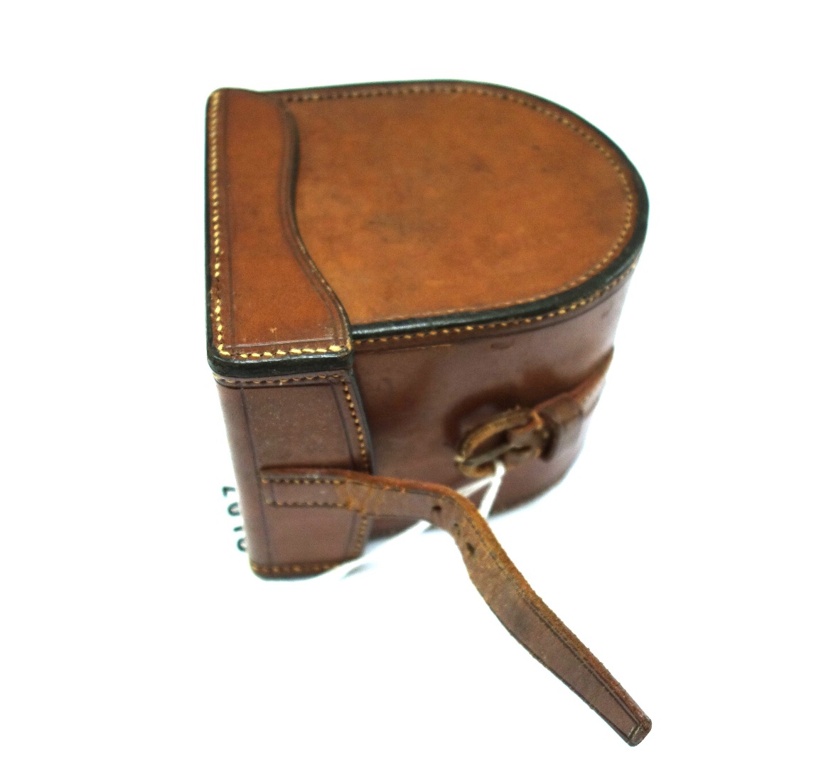 Appraisal: A Hardy Bros leather reel case with purple velvet lining