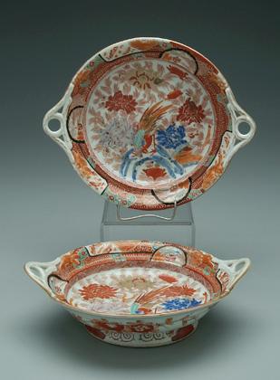 Appraisal: Pair Japanese Imari footed dishes looped handles and molded flowers