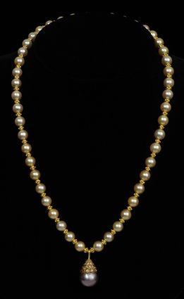 Appraisal: PEARL AND GOLD NECKLACE WITH BAROQUE PEARL AND DIAMOND PENDANT