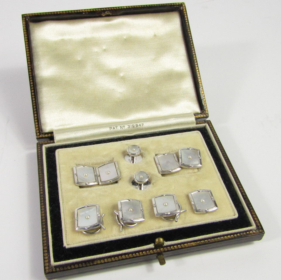 Appraisal: A suite of gentleman's white metal mother of pearl and