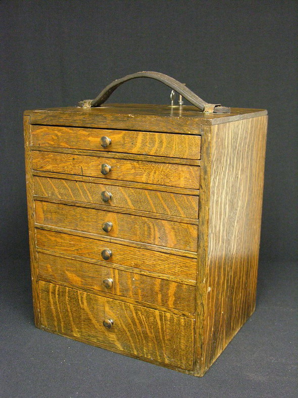 Appraisal: TIGER OAK SEVEN DRAWER TRAVELING DENTAL CASE Circa 'S- 's