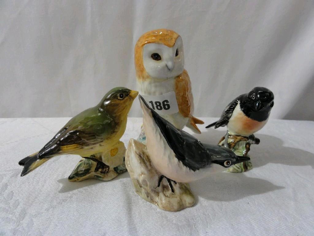 Appraisal: A collection of four Beswick models of birds comprising a