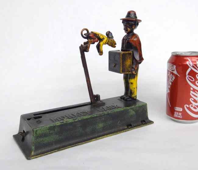 Appraisal: 'Monkey Bank'' mechanical bank with iron trap Made by Hubley