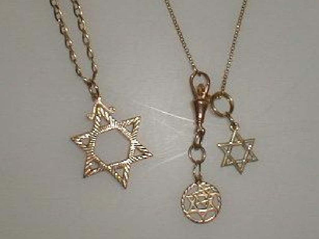 Appraisal: Two Star of David pendants on chains yellow metal