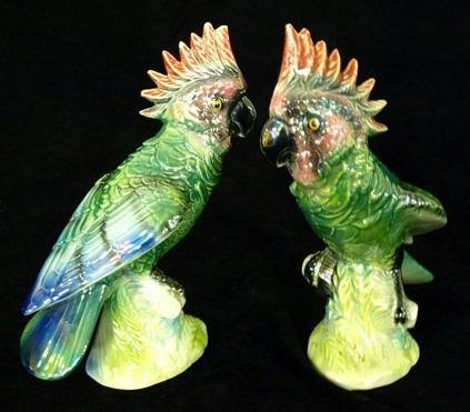 Appraisal: A pair of Jema opalescent glazed exotic birds cm high