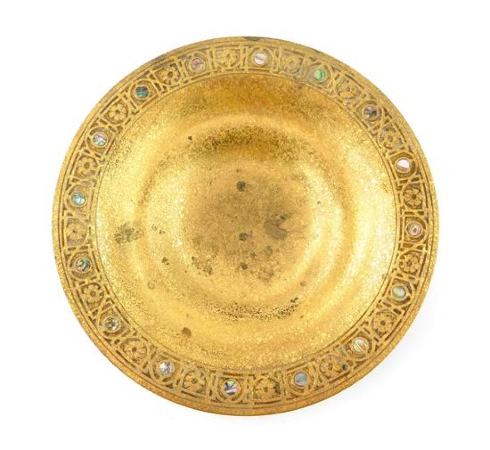 Appraisal: Tiffany Studios gilt bronze plate inlaid with abalone discs around