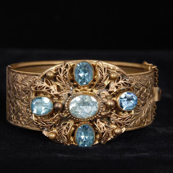 Appraisal: Czech brass hinged cuff bracelet with embossed florals mounted with