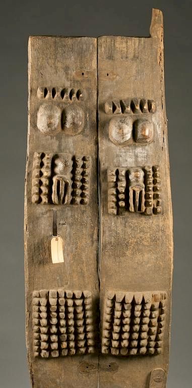 Appraisal: Dogon wooden door th th c A carved wooden door