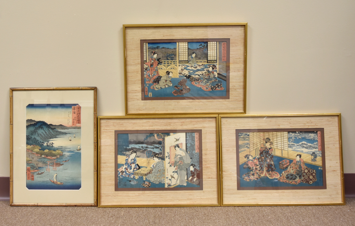 Appraisal: wood block paintings depicting female Japanese figures dressed in lavishly