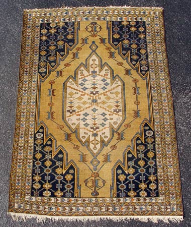 Appraisal: SEMI ANTIQUE CAUCASIAN RUG Approx ' '' x ' ''