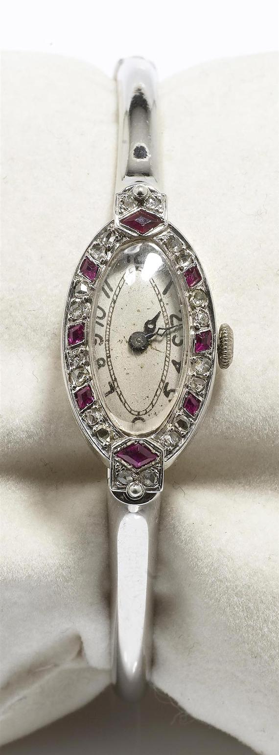 Appraisal: A DIAMOND AND RUBY CLIP WATCH circa - White gold