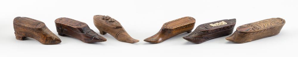 Appraisal: SIX ENGLISH CONTINENTAL SHOE-FORM CHIP-CARVED TREEN SNUFF AND GAMES BOXES