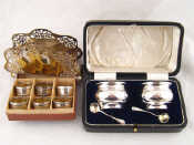 Appraisal: A boxed pair of silver salts with spoons Birmingham and