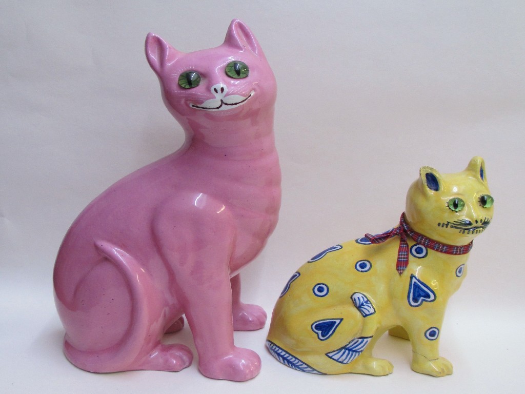 Appraisal: A Wemyss style pink ground model of a cat with