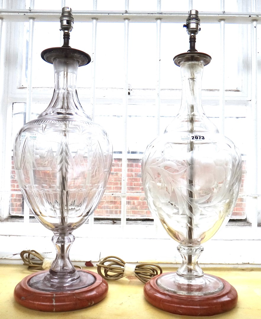 Appraisal: A Victorian clear and etched glass lamp base detailed with