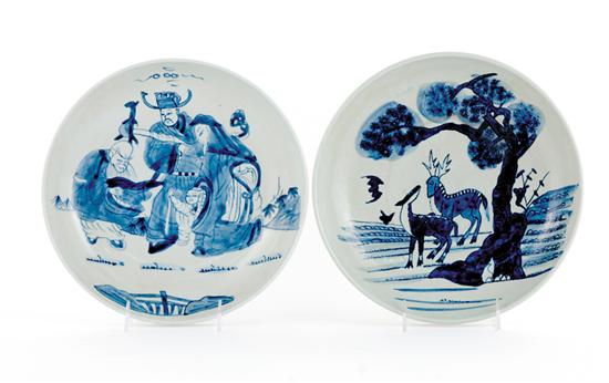 Appraisal: Chinese Export style blue-and-white porcelain plates shallow flared bowl decorated