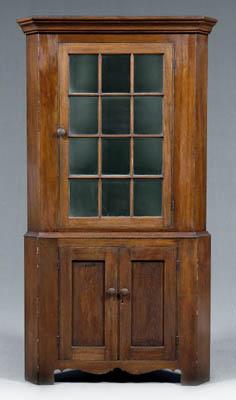 Appraisal: Pennsylvania Federal corner cupboard poplar with pine secondary two-case construction