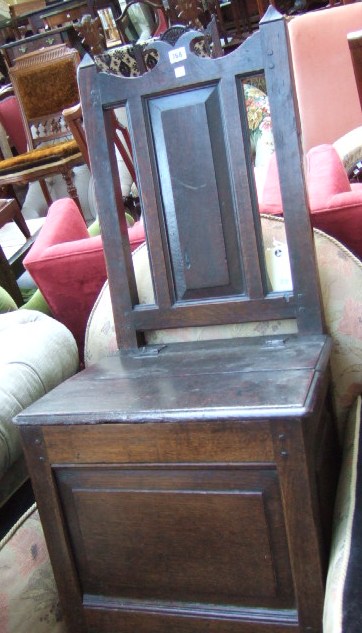 Appraisal: A George II oak box seat chair early th century