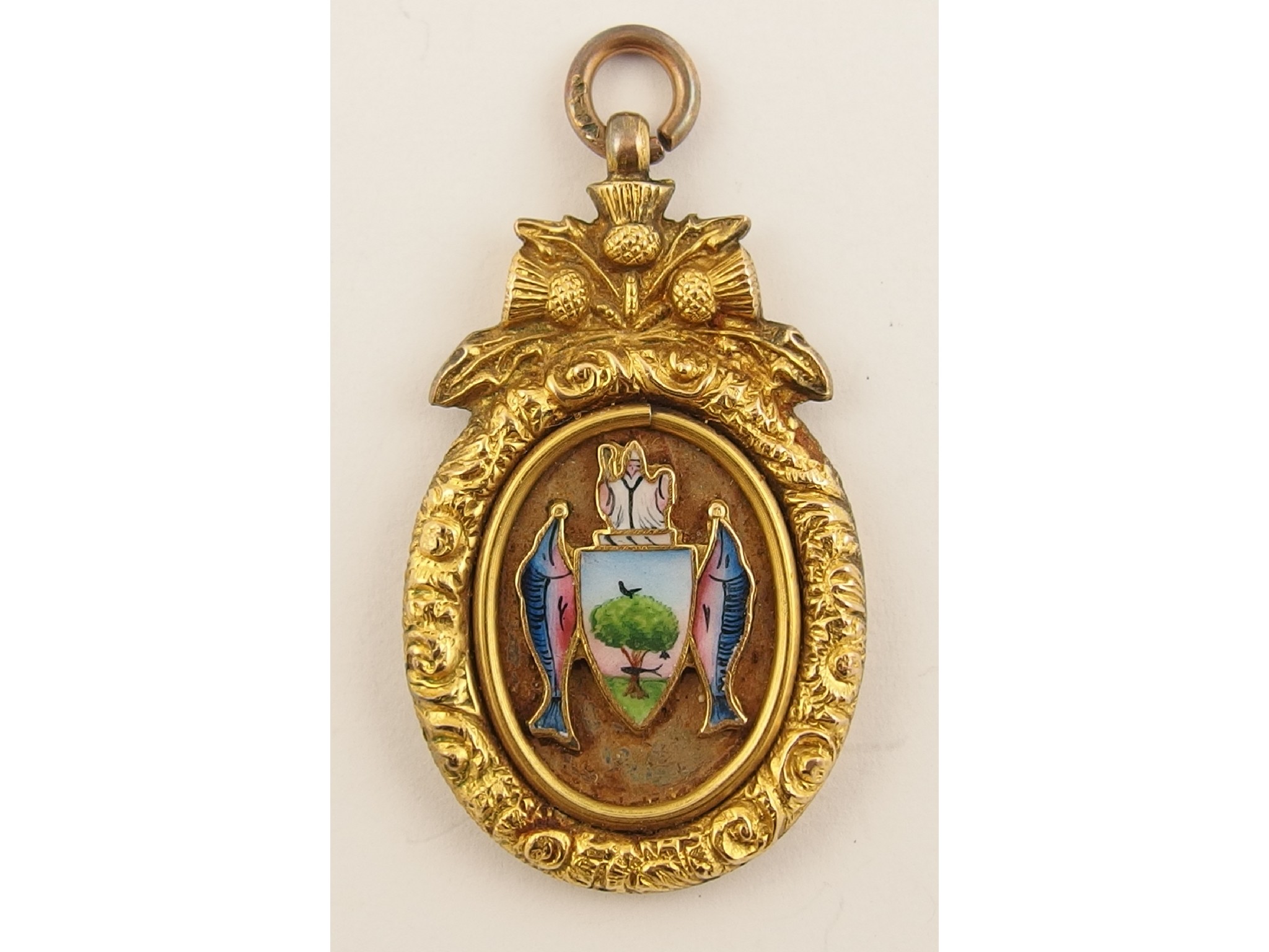 Appraisal: A ct medallion enamelled with the Glasgow Coat of Arms