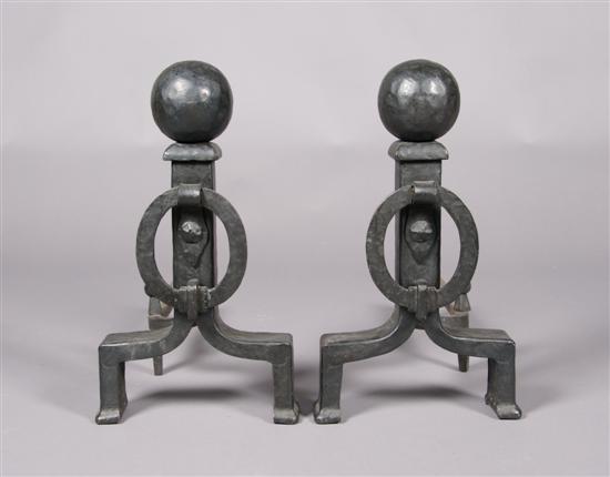 Appraisal: A Pair of Hammered Iron Andirons Height inches