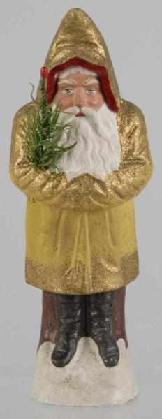 Appraisal: Belsnickel Santa Description Wearing a gold robe and holding a