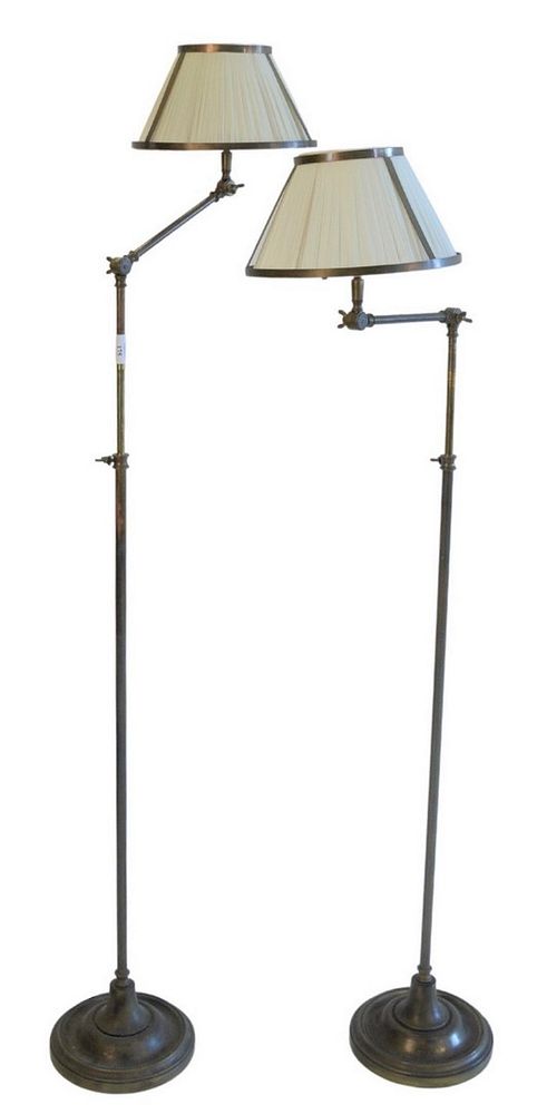 Appraisal: Pair of Bronze Adjustable Floor Lamps with metal framed silk