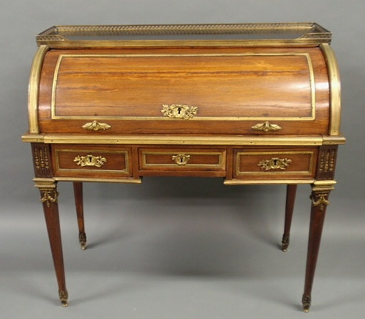 Appraisal: Louis XVI mahogany desk with a roll top and brass