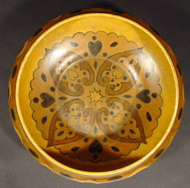 Appraisal: Clews Chameleon Ware bowl hand painted with brown peacock feathers