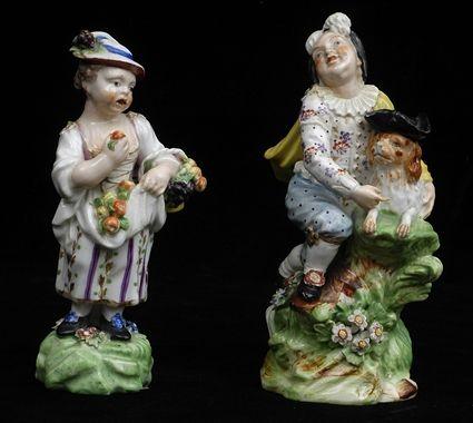 Appraisal: TWO ENGLISH PORCELAIN FIGURES Unmarked the larger a playful child