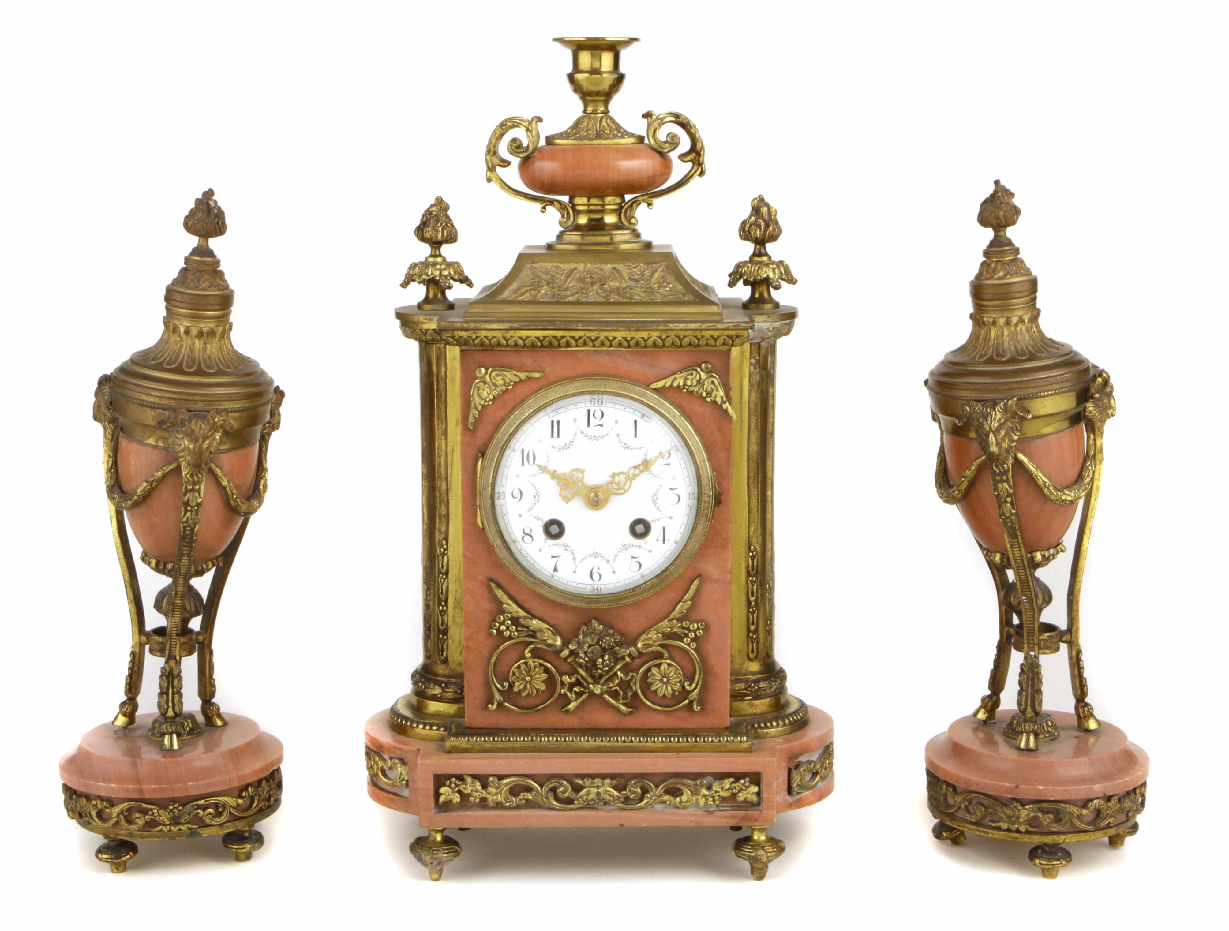 Appraisal: A French gilt bronze and marble clock garniture height of