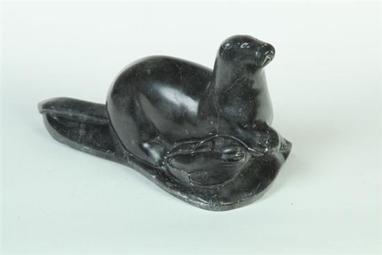 Appraisal: INUIT CARVING Canada mid th century hardstone Black stone seal