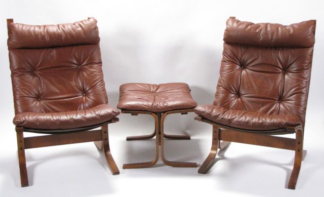 Appraisal: Pair of Westnofa Norway chairs and ottoman teakwood frames with