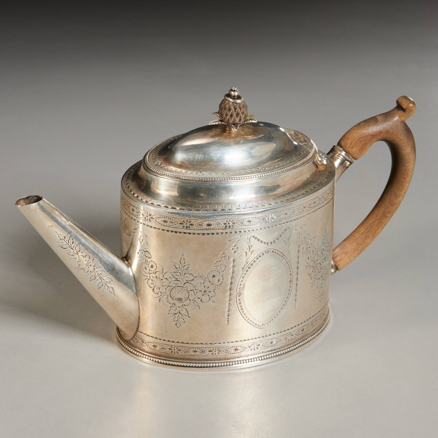 Appraisal: GEORGE III SILVER TEAPOT HESTER BATEMAN London c oval in