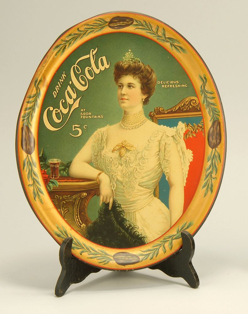 Appraisal: OVAL COCA-COLA ADVERTISING TRAY Depicting an early th century woman