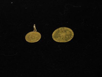 Appraisal: Two yellow gold coins One engraved United States of American