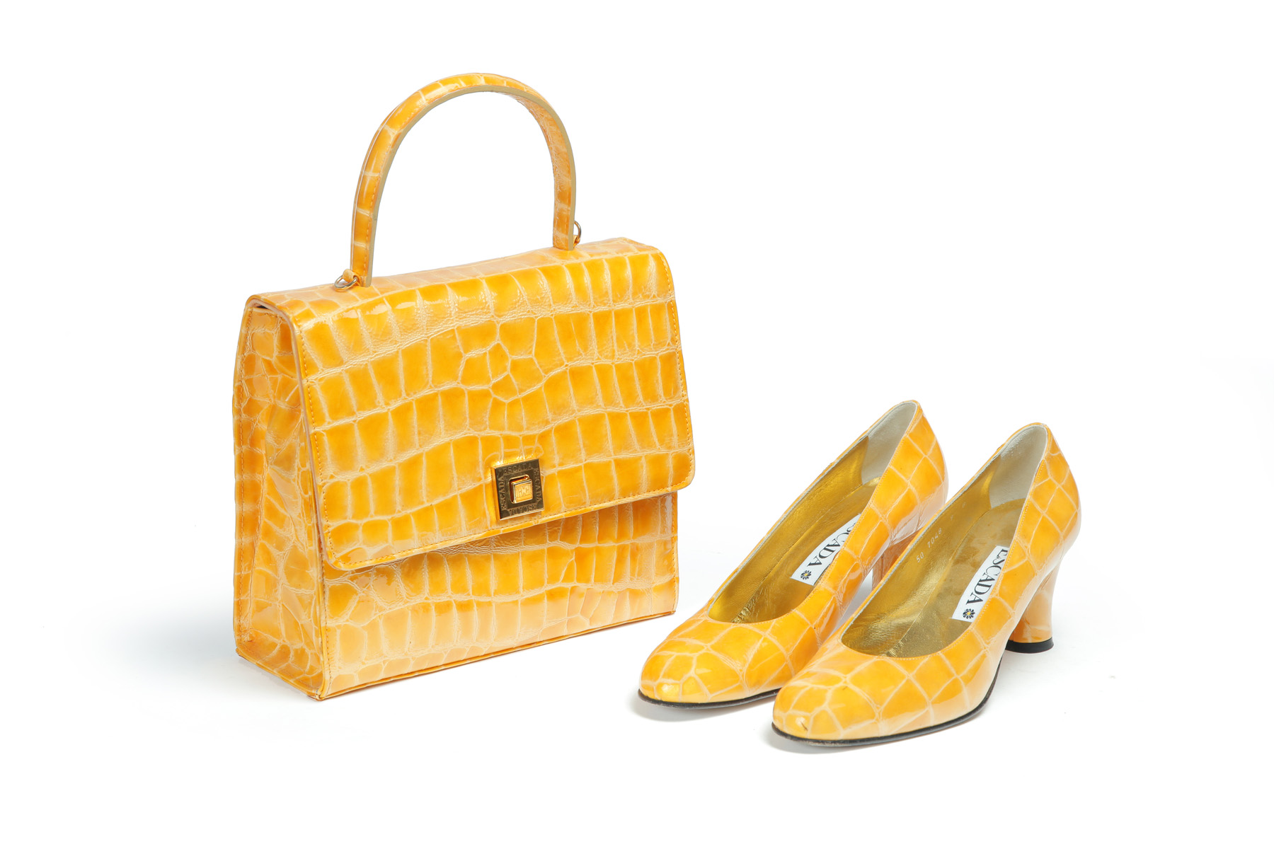 Appraisal: ESCADA YELLOW EMBOSSED LEATHER HANDBAG AND MATCHING SHOES Italy late