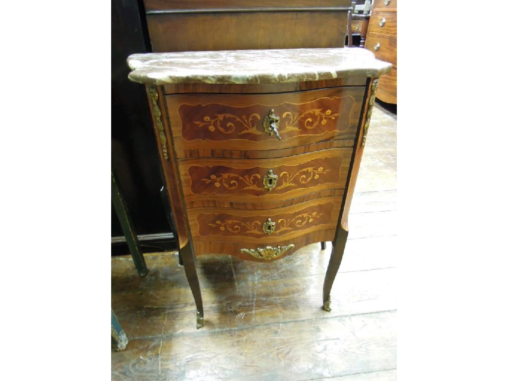 Appraisal: A continental mahogany veneered bedside chest with serpentine outline and