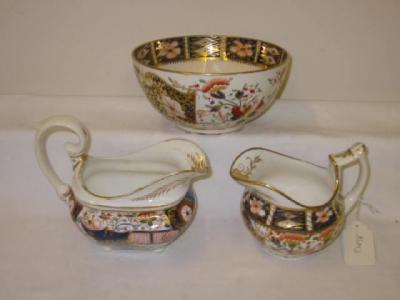 Appraisal: A DERBY PORCELAIN JUG AND SUGAR BOWL painted with Imari