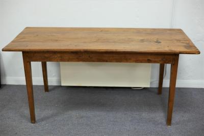 Appraisal: A th Century French fruitwood table on square taper legs