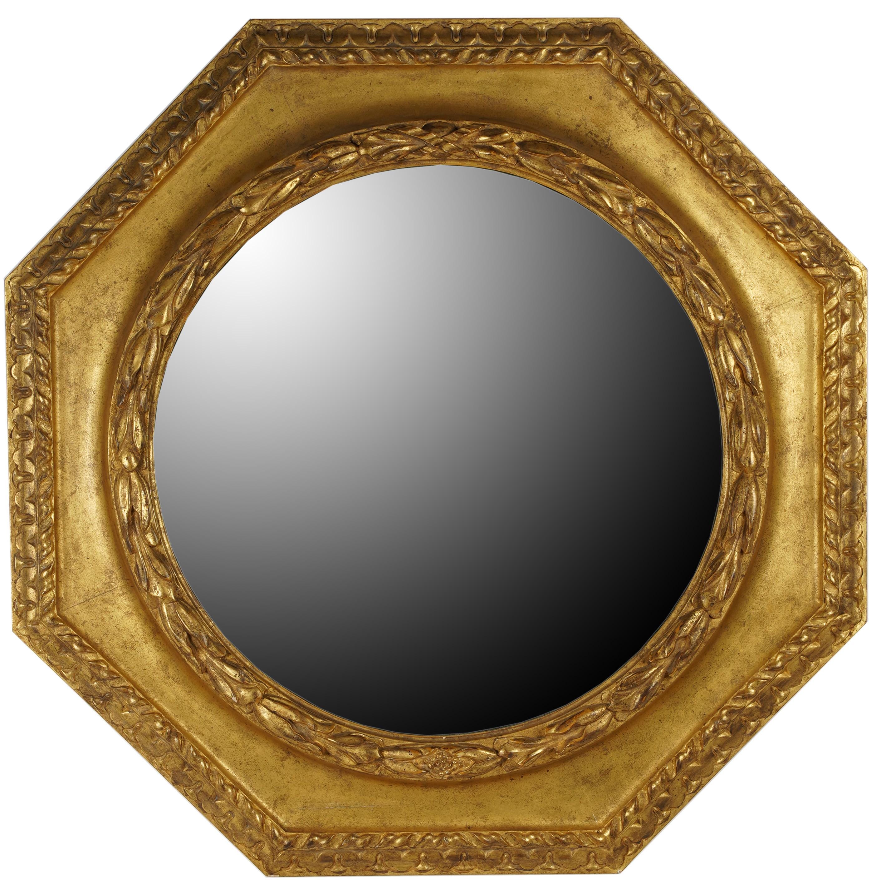 Appraisal: NEOCLASSIC STYLE OCTAGONAL GILTWOOD WALL MIRROR with round beveled mirror