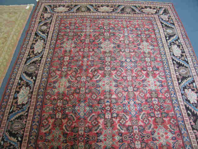 Appraisal: Mahal Persian Handmade Rug overall stylized floral reds ivory blues