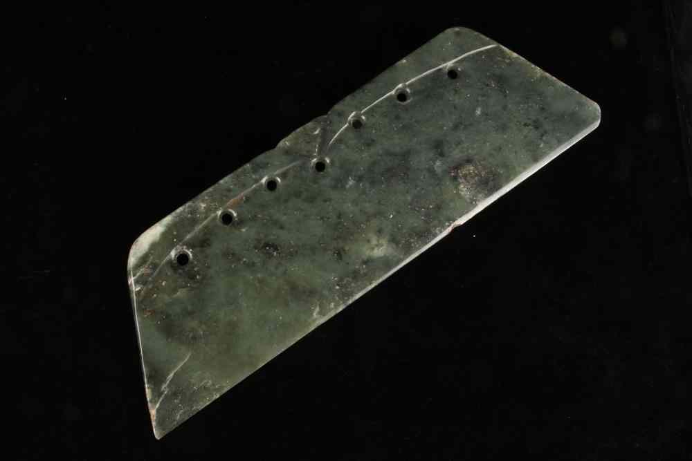 Appraisal: CHINESE NEOLITHIC JADE CEREMONIAL AXE BLADE of variegated green stone