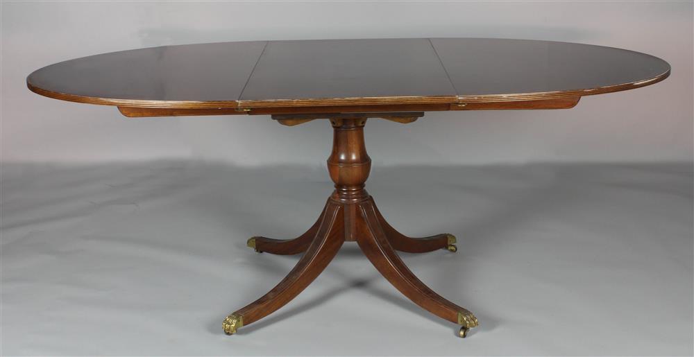 Appraisal: ENGLISH REGENCY STYLE INLAID MAHOGANY EXPANDING OVAL BREAKFAST TABLE having