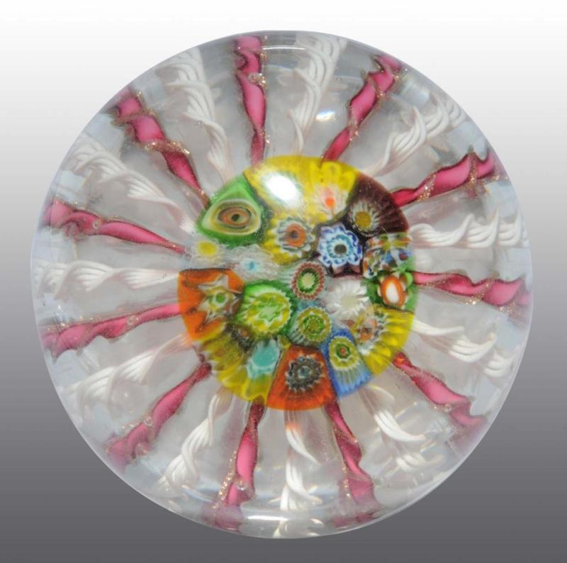 Appraisal: Murano Millefiori Paperweight Description Unique center with white and pink